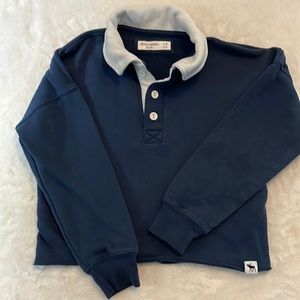 Abercrombie Kids long sleeve steel blue button collared cropped sweat shirt.
